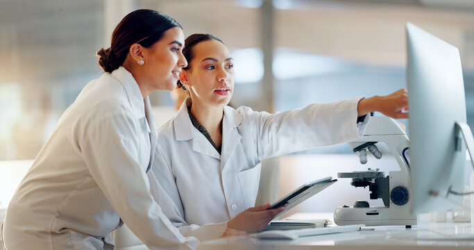 Scientist, women and teamwork on tablet and computer for laboratory advice, medical research and night planning. Students, science people or mentor on digital technology of test results or comparison - Powered by Adobe