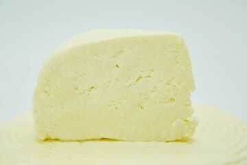 Paneer or tofu milk cheese. The product is ready to use. White background.