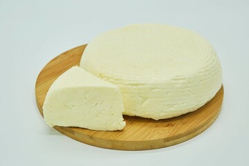 Paneer or tofu milk cheese. The product is ready to use. White background.