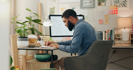 Night, desk and a black man with a notebook for planning of work goals, target or ideas for a...