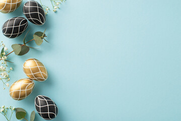 Easter celebration concept: Top view of rich black and gold eggs, natural eucalyptus foliage,...
