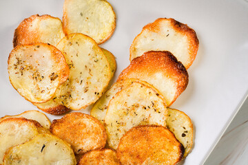 Homemade Potato Chips on black Board