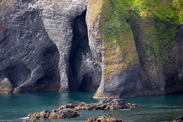 Bizarre rock formation at Halldorsskora or Elephant Rock on the coast of Heimaey Island...