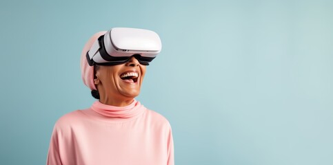 A 63-year-old Hispanic woman smiling as she experiences virtual reality with wireless VR goggles against a soft pastel backdrop with ample copy space, her eyes reflecting the wonder of the virtual wor