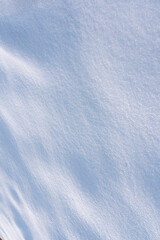 natural Snowdrift in sunny day. Nature Winter snow texture background.