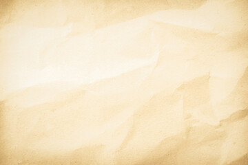 Old paper vintage texture surface for background. Recycle pale brown paper crumpled texture, Cream color recycled kraft paper texture blank with copy space for text.