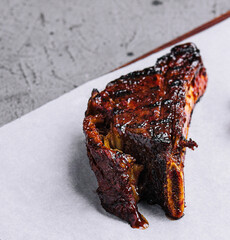 Baked pork ribs close up