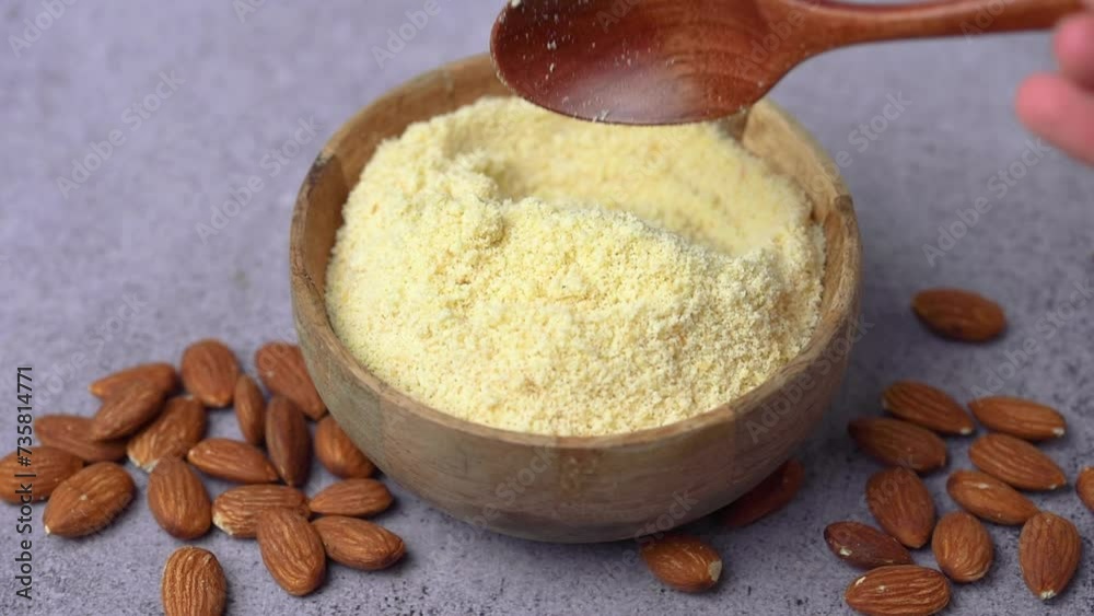 Canvas Prints fresh almond flour in a bowl and almonds