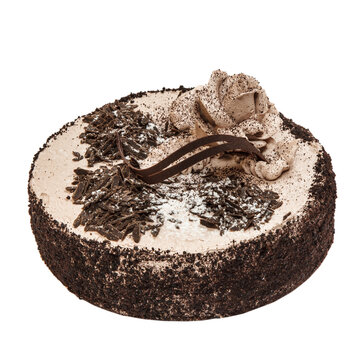 Сake decorated with chocolate cream and grated chocolate isolated on a white background. A picture for a menu or a catalog of confectionery products.