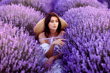 Beautiful girl on the lavender field.