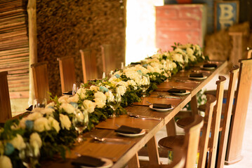 Beautiful Wooden Dinner table setup in a barn house
