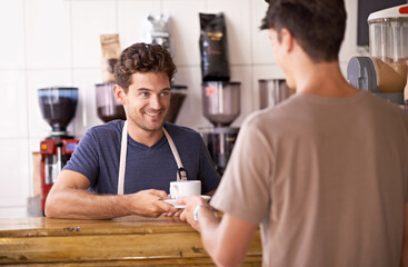 Man, barista and cup in coffee shop, serving customer and working in restaurant or small business. Male person, entrepreneur and caffeine expertise in bistro, confidence and friendly in hospitality