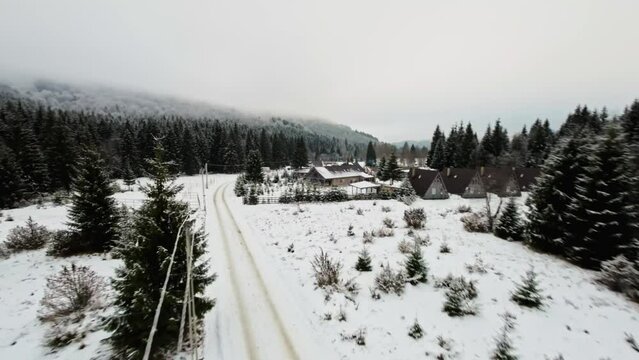 Landscape view from the drone with mountains with snow on Winter in Romania