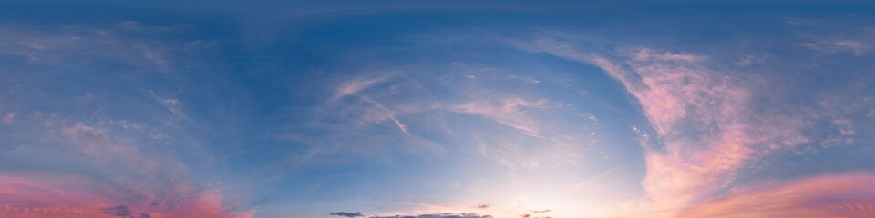 Bright sunset sky panorama with glowing red pink Cirrus clouds. HDR 360 seamless spherical panorama. Sky dome or zenith in 3D, sky replacement for aerial drone panoramas. Climate and weather change.