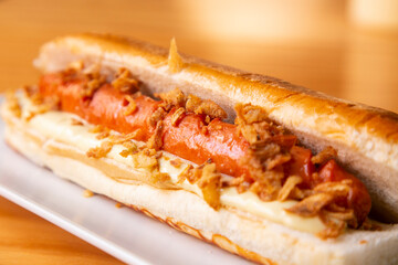 Hot dog with premium sausage and fried onion.