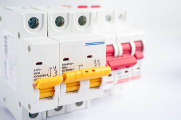 Automatic circuit breaker on white background, control and protect electrical power system.