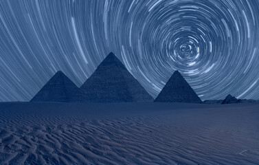 Giza Pyramid Complex with Starry sky at night - Cairo, Egypt 