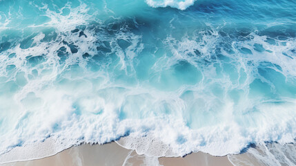 Aerial view of ocean waves. Blue water background.