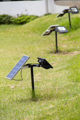 Line of solar panels mounted on metallic poles for alternative source of electrical energy