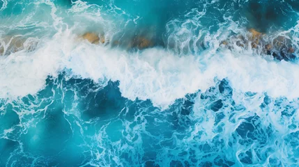 Fototapeten Aerial view of ocean waves. Blue water background. © Ashley