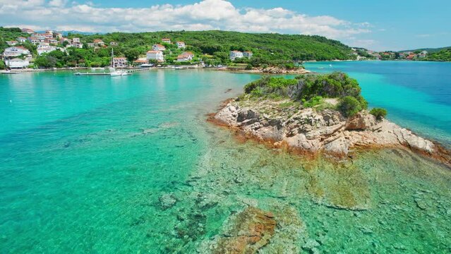 Amazing crystal clear sea water of the Gonar beach on Rab island, Croatia