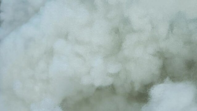 Holofiber synthetic pillow filler close-up, vertical shoot