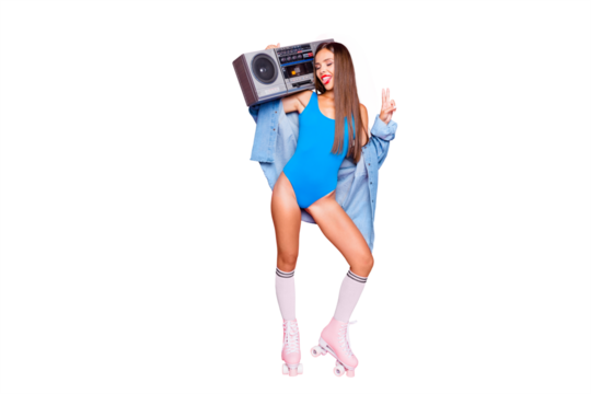 Party mood! Full-size portrait of beautiful brunette girl on roller skates with a boombox showing v-sign and laughing isolated on bright pink background