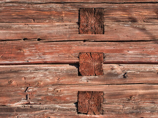 Obraz premium old log building wall exterior detail