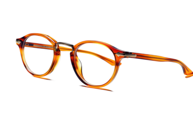 A Pair of Glasses. A pair of eyeglasses, featuring a clear frame and lenses, rests on a plain Transparent background.