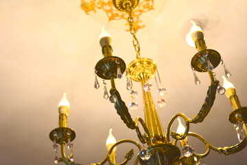 Fototapeta na wymiar Beautiful living room candle chandelier