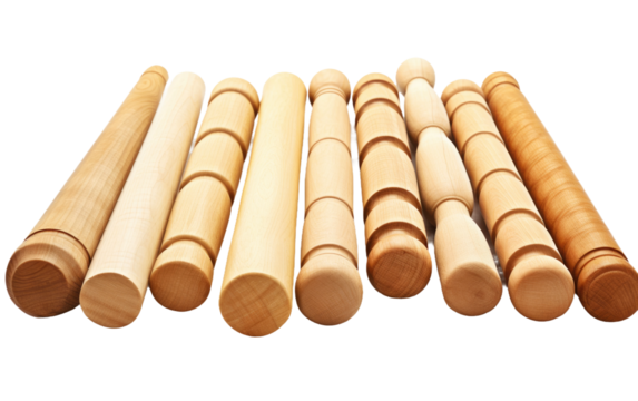 Group of Wooden Dowels Arranged Together. A collection of wooden dowels sitting side by side, showcasing their uniformity and close proximity.