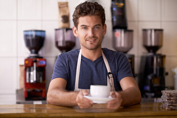 Man, barista and cup in coffee shop, portrait and working in restaurant or small business. Male person, entrepreneur and caffeine expertise in bistro, confidence and pride in career and hospitality