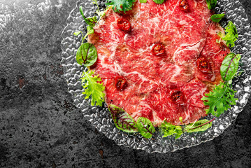 Beef carpaccio slice meat on plate