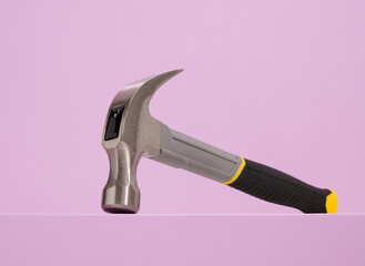 Hammer with rubber handle. DIY tools. Instruments and equipment.