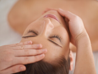 Hands, face and massage woman at spa to relax, wellness and calm at luxury resort for acupressure...
