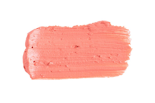 Orange clay mask texture isolated on white background. Clay mask cream to the face and body.