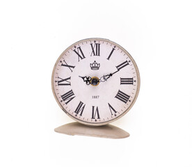 old rusty vintage white alarm clock isolated on white background