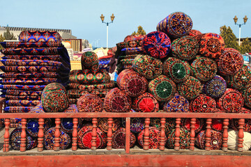 Turkmenistan. Ashkhabad market. National Turkmen mattresses and handmade pillows - obrazy, fototapety, plakaty
