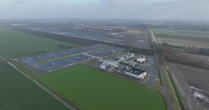 Earthquakes due to gas extraction, natural gas field installation in Groningen. Aerial birds eye view.