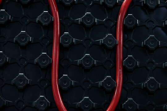 closeup of warm water underfloor heating system