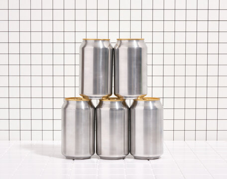 Refreshing drinks in shiny aluminum cans. Party vacation and alcoholic disco.