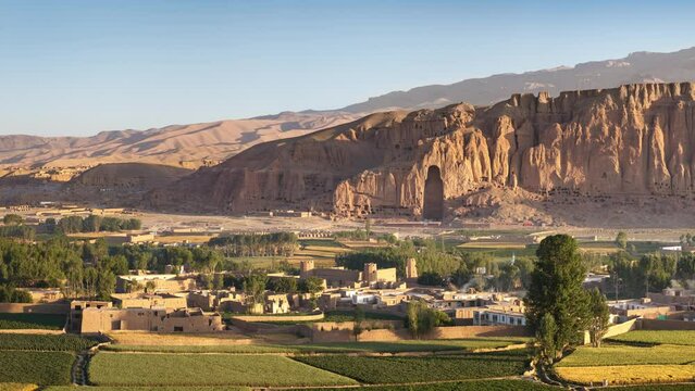 Afghanistan, Bamiyan (Bamian or Bamyan), panoramic view of valley, town and empty niches where Buddha statues were destroyed, cultural landscape and archeological remains, UNESCO World Heritage 