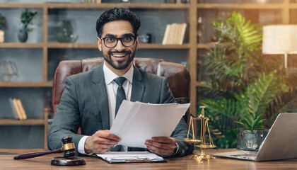 Obraz premium lawyer reading legal documents for client; attorney, notary, divorce process, looking at camera