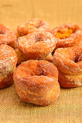 Gastronomic Still Life: Close-up of Aniseed Donuts on Burlap