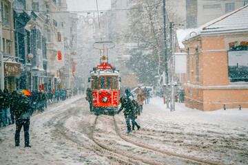 Istanbul, Turkey, 15 February 2021; Winter and Red Tram in Istiklal Street, Beyoglu, Istanbul.