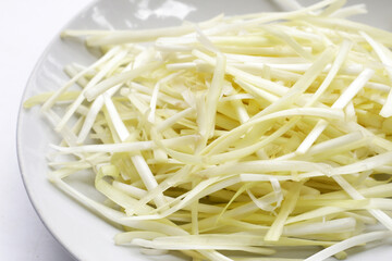 White garlic chives on white backgreound.