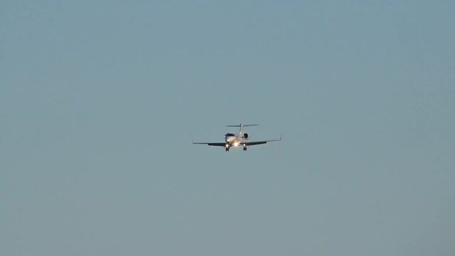 Light private jet head on front final approach into airport