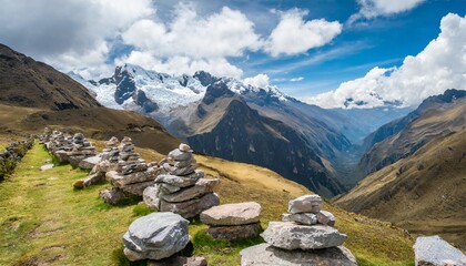 Fototapeta na wymiar a group of rocks guide the eye towards a vast mountain range in the peruvian highlands horizontal