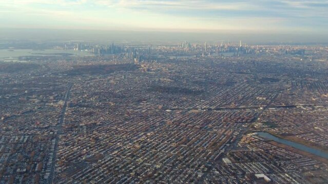 New York city skyline as seen from airplane window seat departing john f kennedy airport usa