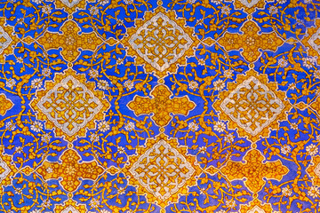 Ornament pattern at the wall of Tilya Kori Madrasa. Gold and blue. Traditional Uzbek decorative...